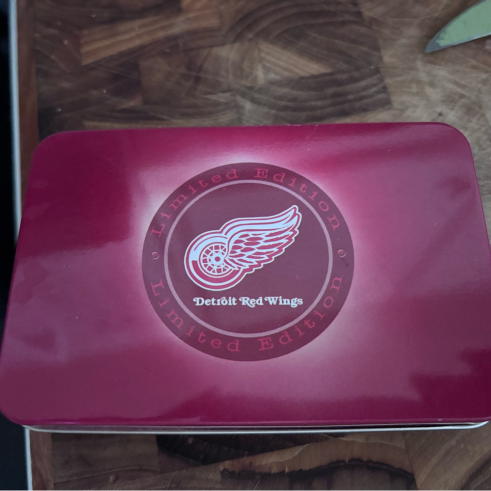 Official Detroit Red Wings collectible knife in original tin.